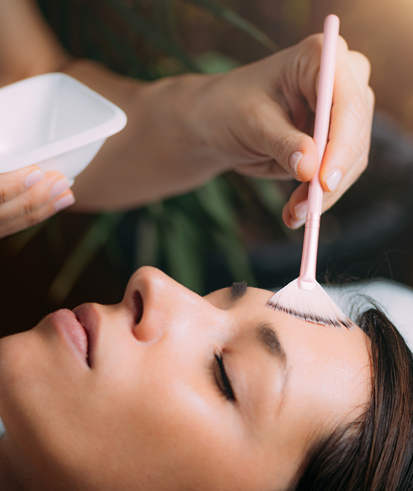 Photo of a woman getting a chemical peel treatment